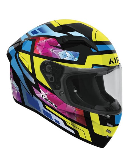Casque de moto Airoh Conor coloré avec visière frontale et motifs géométriques jaunes, bleus et roses
